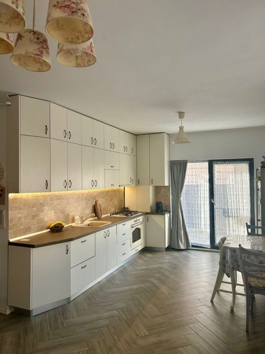Apartament cu 3 camere, cu gradina, parcare, Borhanci