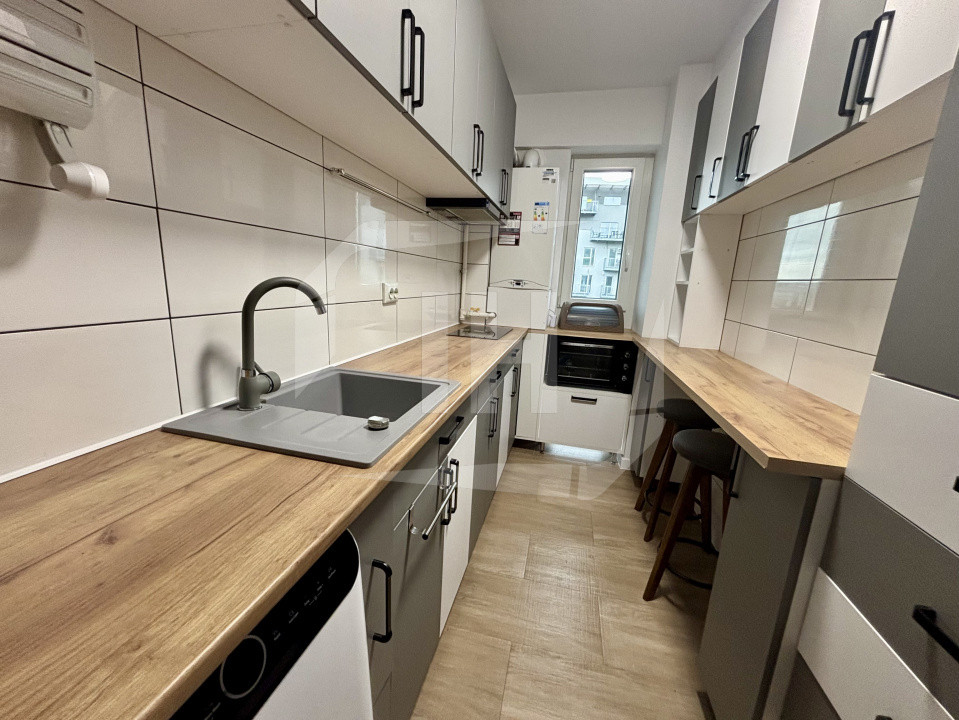 Apartament 3 camere, 2 bai, cu parcare, scara interioara, zona Garii