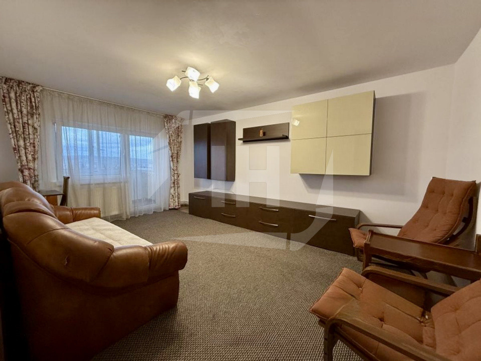 Apartament 4 camere, 2 bai, decomandat, cu parcare, zona Nicolae Titulescu