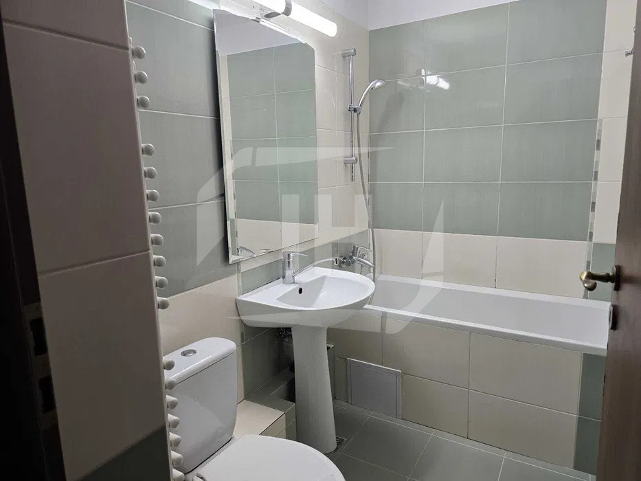 Apartament 4 camere, 2 bai, decomandat, cu parcare, zona Nicolae Titulescu