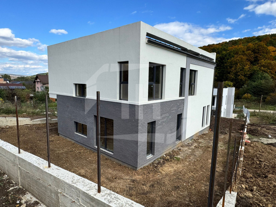 Casa Individuala finalizata, 2 garaje. zona Roata Faget