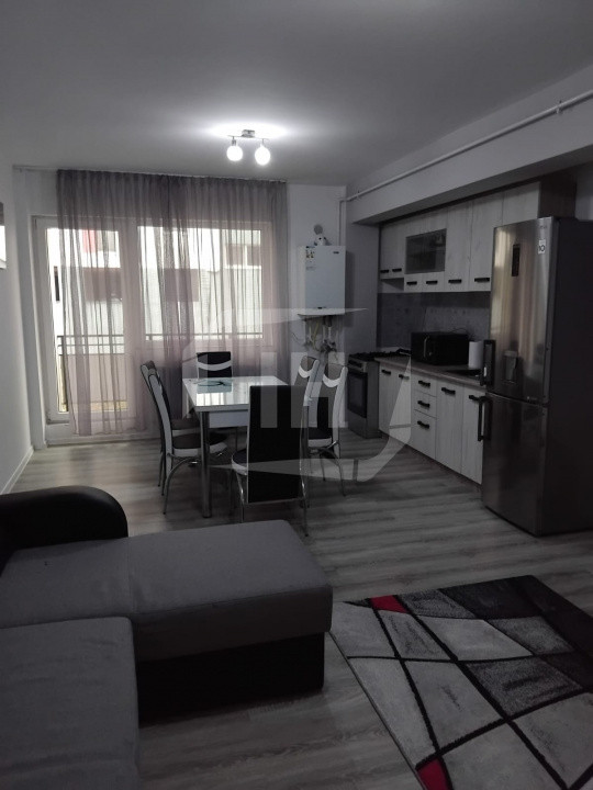Apartament 2 camere, 55 mp utili, etaj 2/3, parcare acoperita, zona Regal