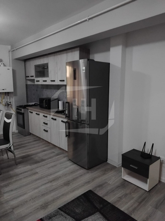 Apartament 2 camere, 55 mp utili, etaj 2/3, parcare acoperita, zona Regal