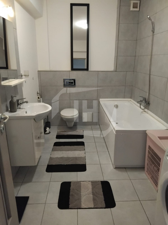 Apartament 2 camere, 55 mp utili, etaj 2/3, parcare acoperita, zona Regal
